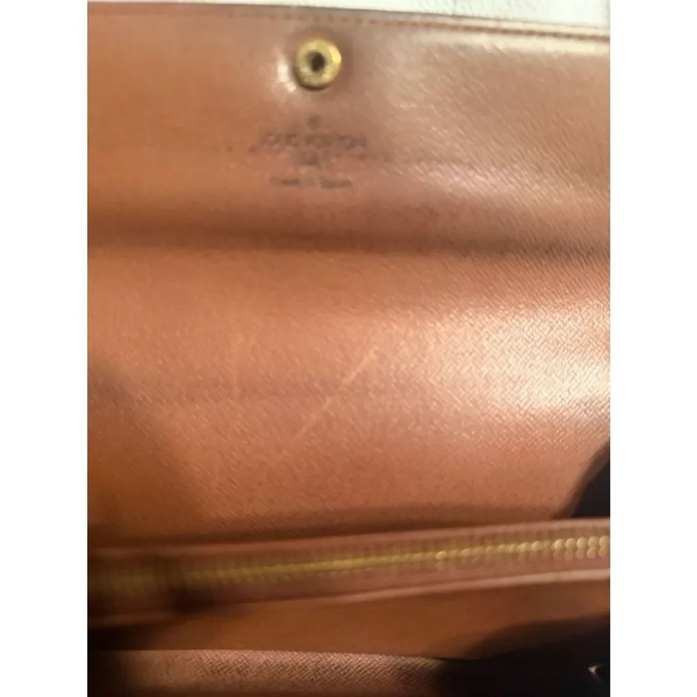 Authentic Louis Vuitton Brown Sarah Long Wallet.